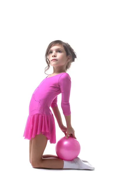 Image of cute little gymnast posing with ball — Stock Photo, Image