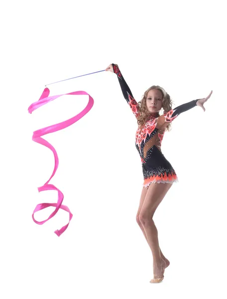 Graceful little gymnast dancing with ribbon — Stock Photo, Image