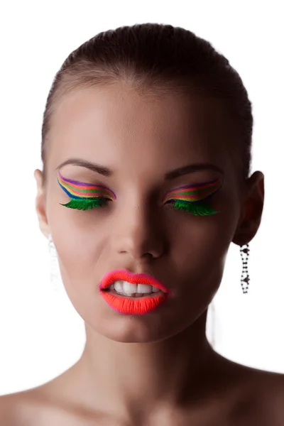 Gezicht van mooi meisje met heldere UV-make-up — Stockfoto