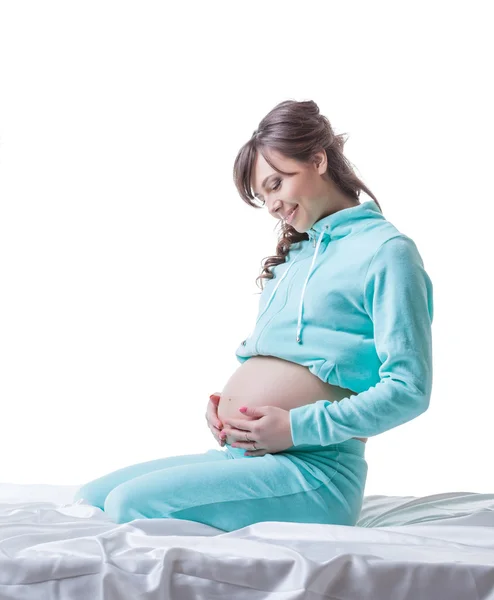 Afbeelding van zwangere vrouw zachtjes streelde haar buik — Stockfoto