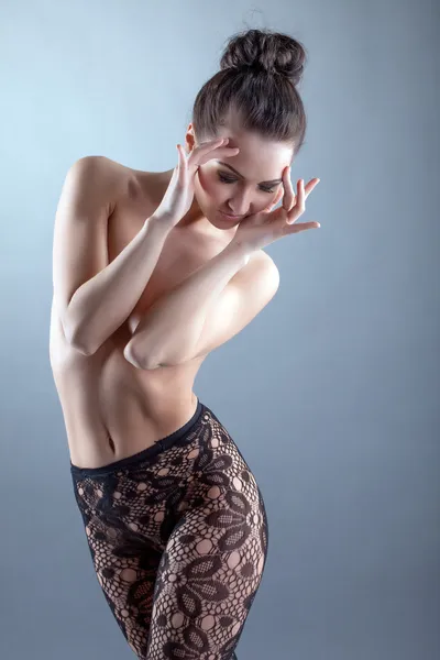 Sensual naked model posing in fancy pantyhose — Stock Photo, Image