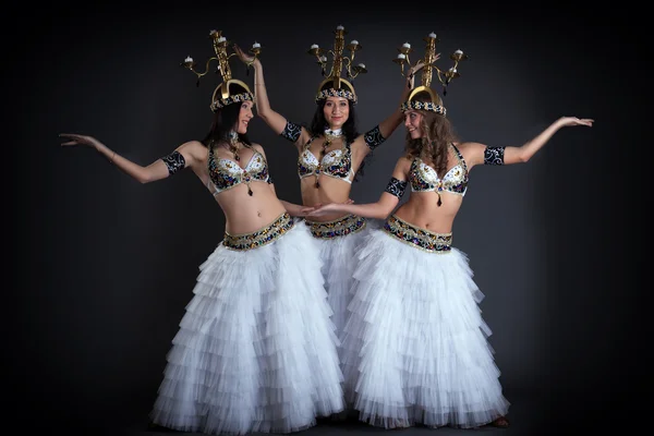 Pretty young girls dancing with chandeliers — Stock Photo, Image