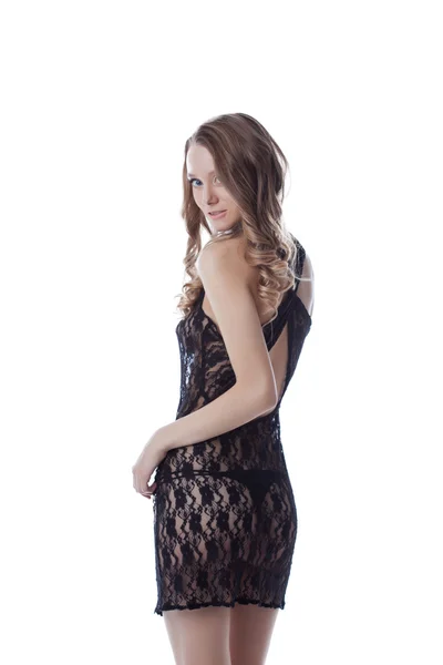 Pretty slim girl posing in lacy negligee — Stock Photo, Image