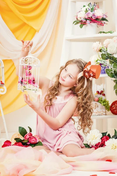 Charming elegant girl posing in festive interior — Stock Photo, Image