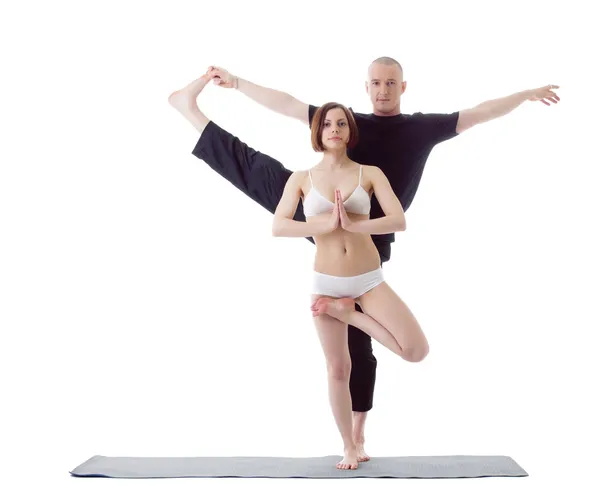 Attractive Europeans practicing yoga at camera — Stock Photo, Image