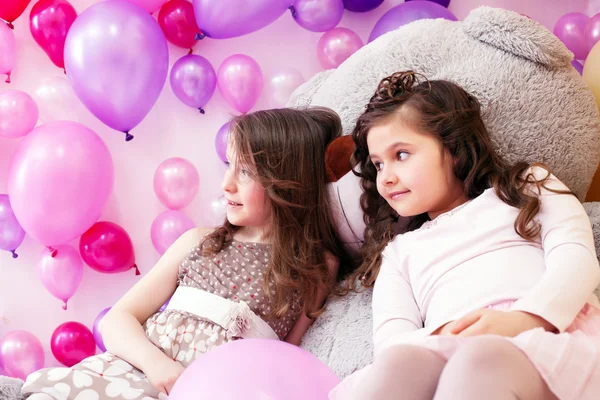 Image of elegant girlfriends posing in playroom — Stock Photo, Image