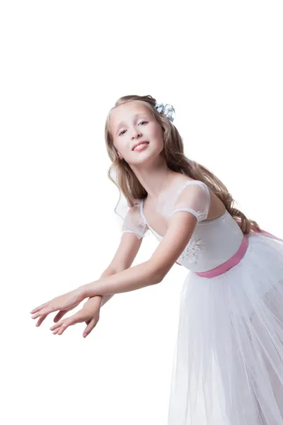 Graceful young girl posing in dance at camera — Stock Photo, Image