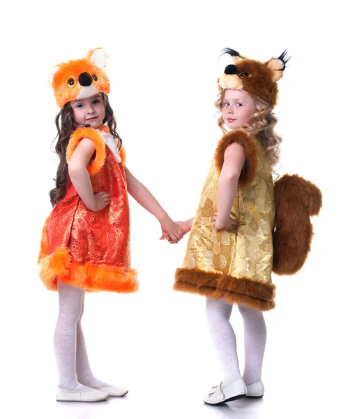 Sevimli genç arkadaşlar karnaval kostümleri poz — Stok fotoğraf