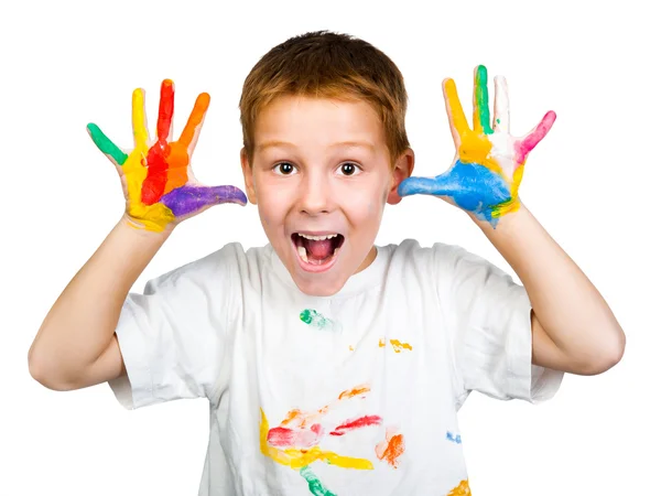 Smiling boy with hands in paint — Stock Photo, Image