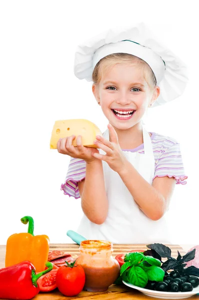 Little girl cuting sausage — Stok fotoğraf