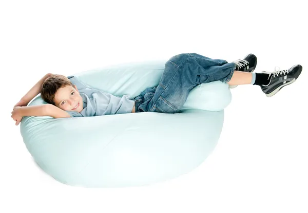 Boy on armchair — Stock Photo, Image