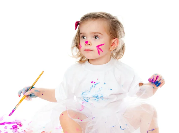 Schattig klein meisje schilderij — Stockfoto