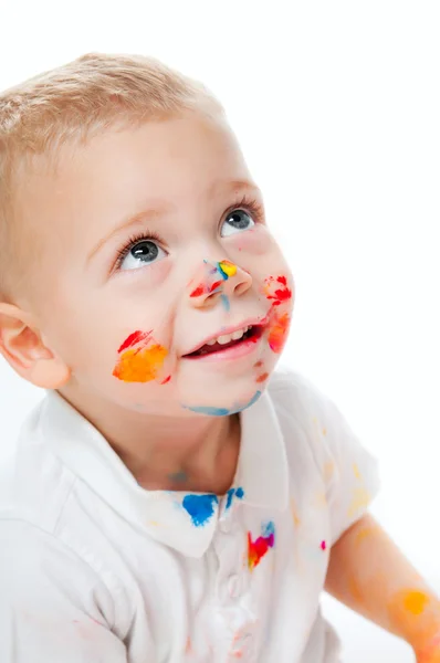 Niño pequeño en pintura —  Fotos de Stock