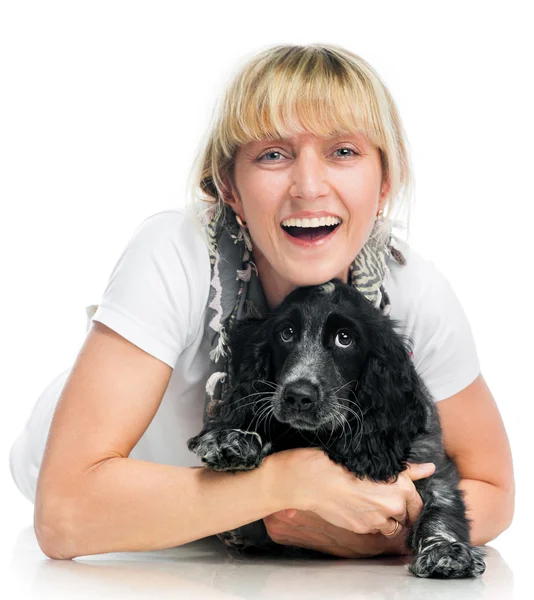 Cocker spaniel and young woman — Stock Photo, Image