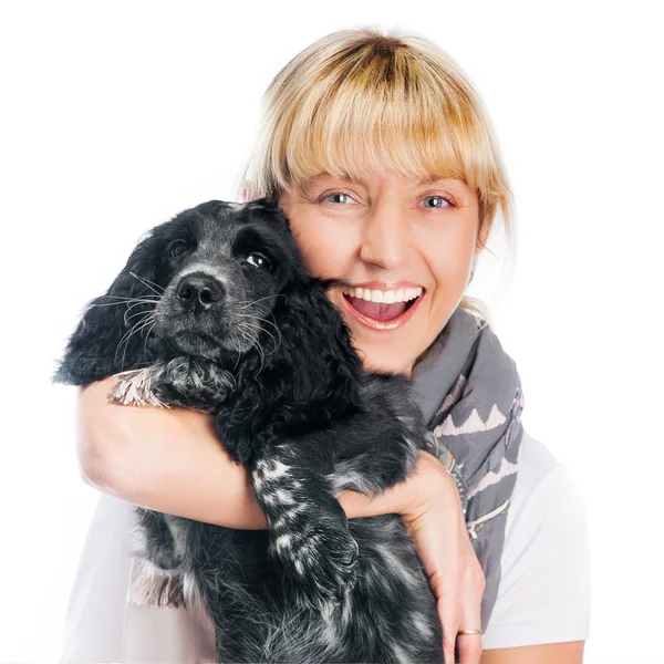 Cocker spaniel and young woman — Stock Photo, Image