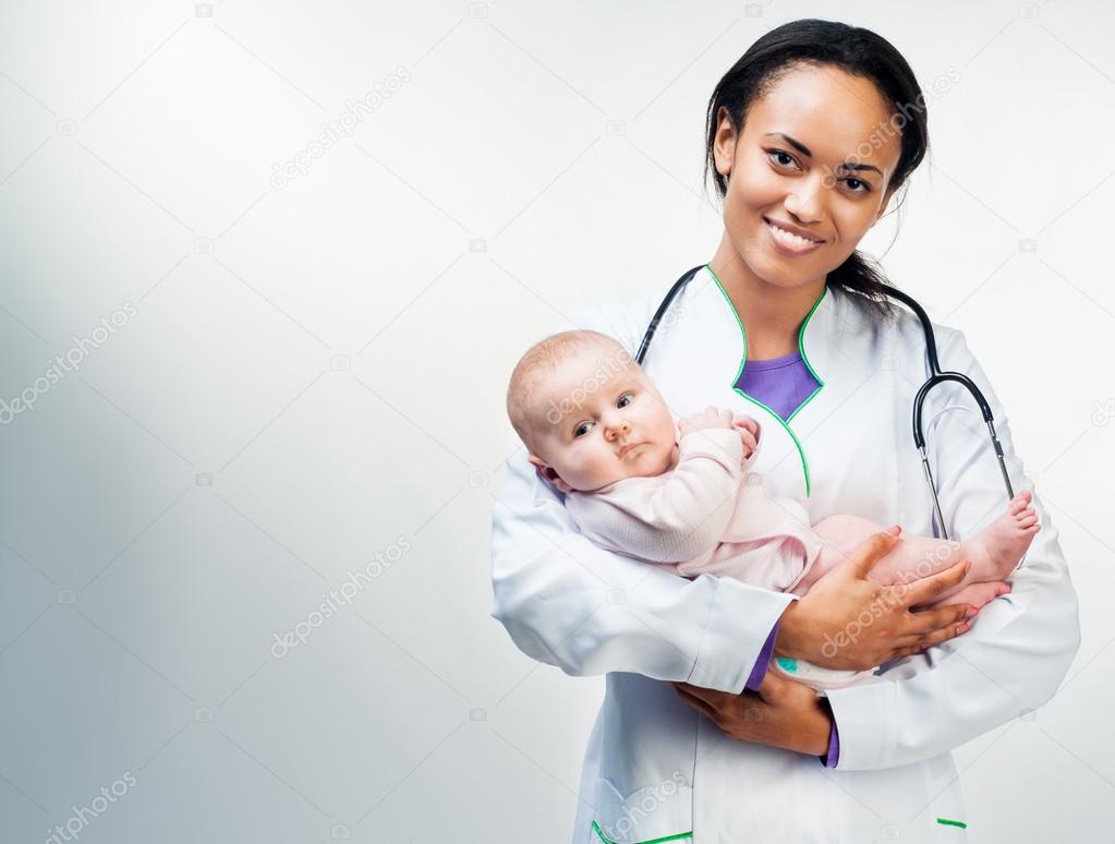 Doctor and baby on a white background