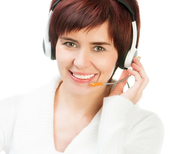 Mujer bonita en un auricular — Foto de Stock