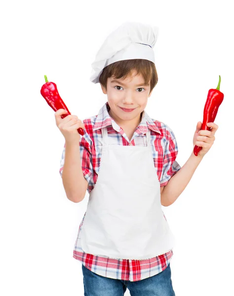 Niño con pimientos — Foto de Stock