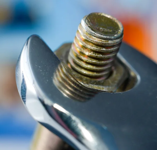 Chrome spanner with nut — Stock Photo, Image