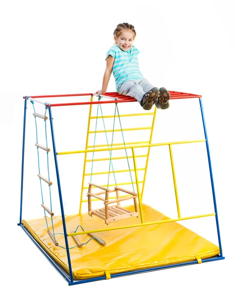 Menina em um playground — Fotografia de Stock