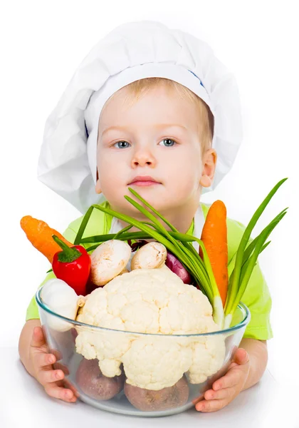 Menino com legumes — Fotografia de Stock