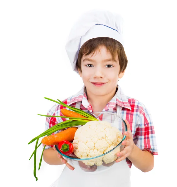 Menino com legumes — Fotografia de Stock