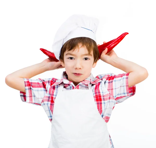 Boy with peppers — Stock Photo, Image