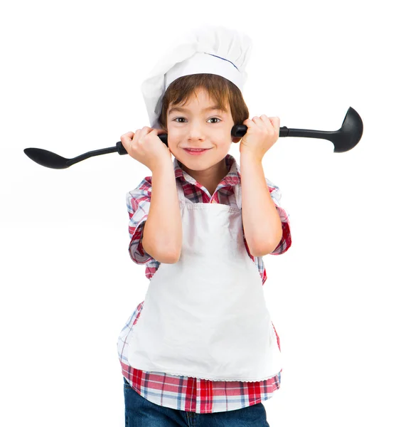Niño con cucharas negras — Foto de Stock