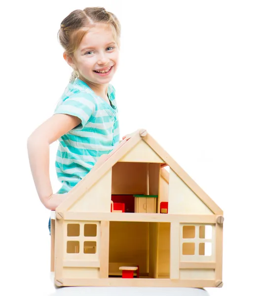 Mädchen mit einem Spielzeughaus — Stockfoto