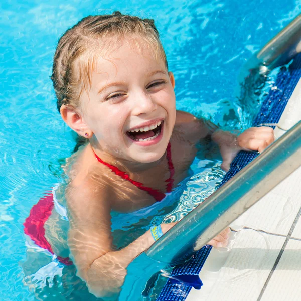 Pretty little girl in swimming... — Stock Photo, Image