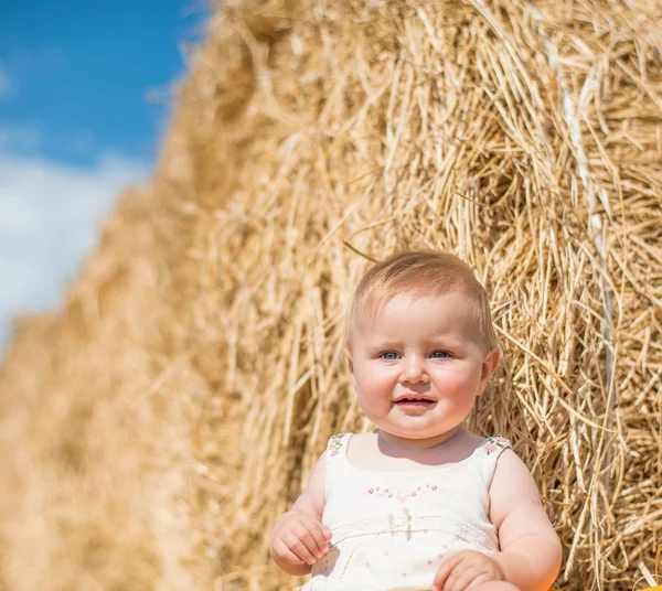 Baby on hay — Stock Photo, Image