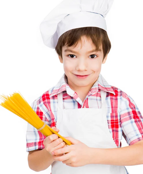 Pojke med spaghetti — Stockfoto