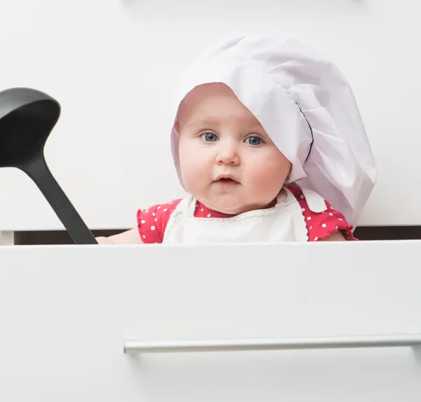 Little baby in a chef's hat — Stock Photo, Image