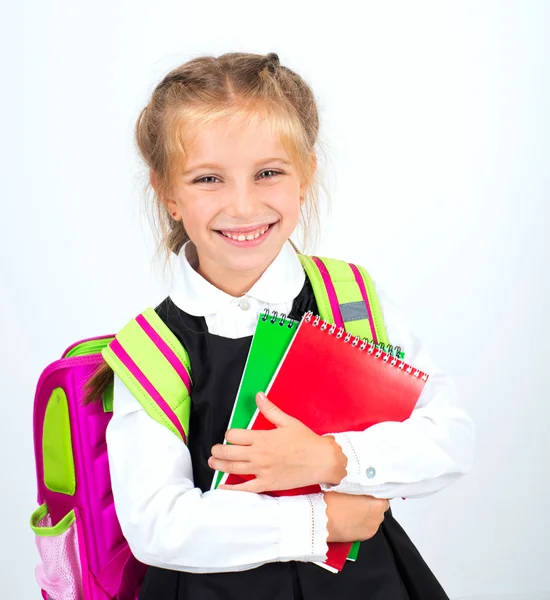 Pequeña linda chica con una papelería — Foto de Stock