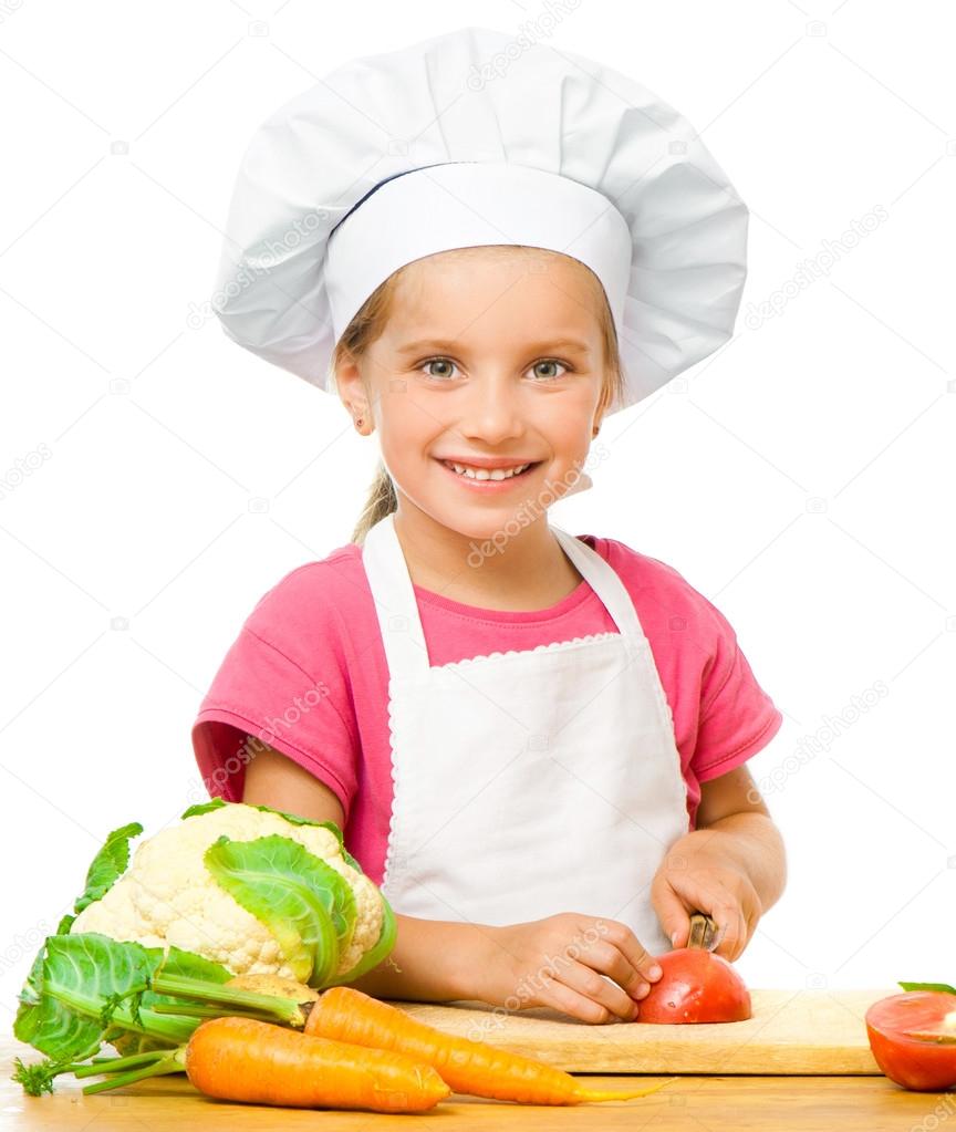 beautiful little girl with vegetables