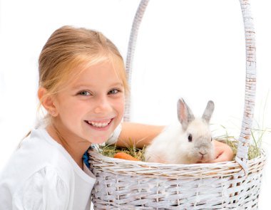 Little girl with a rabbit