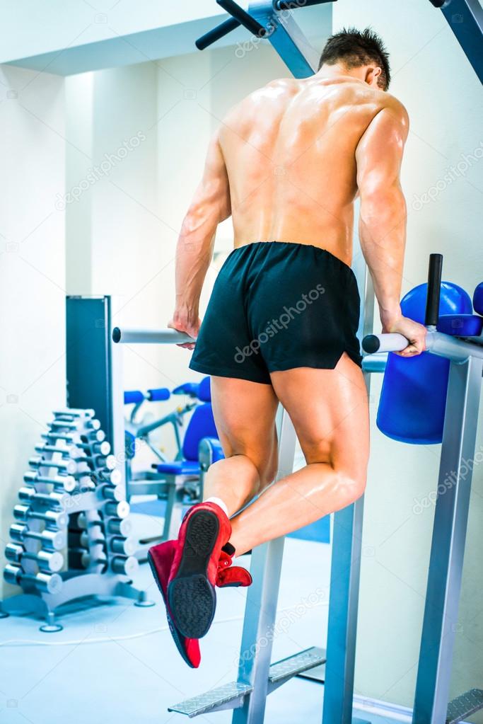 bodybuilder doing exercises