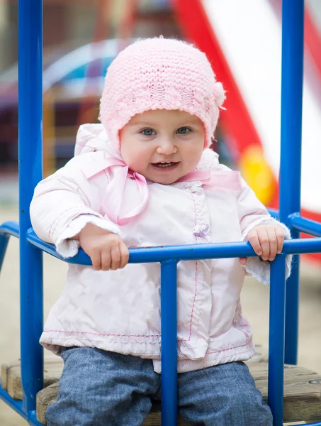 Little baby in a swing — Stock Photo, Image