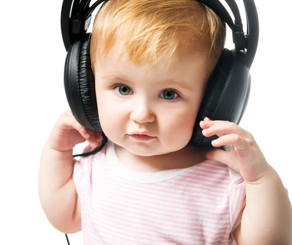 Baby in big headphones — Stock Photo, Image