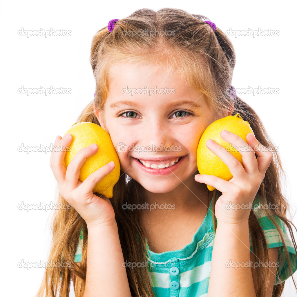 little girl with lemon