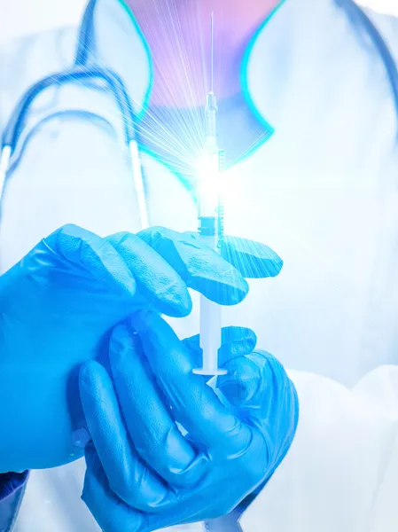 Hands with syringe — Stock Photo, Image