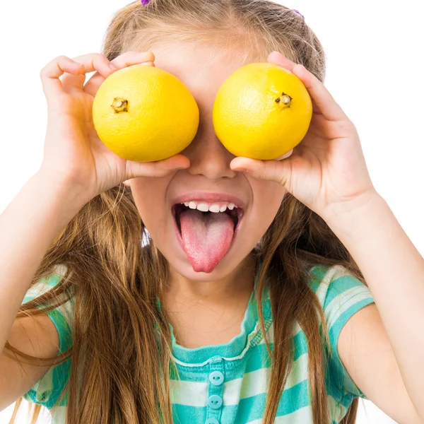 Kislány citrommal — Stock Fotó