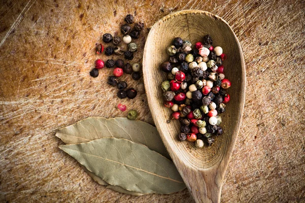 Spices in a spoon — Stock Photo, Image