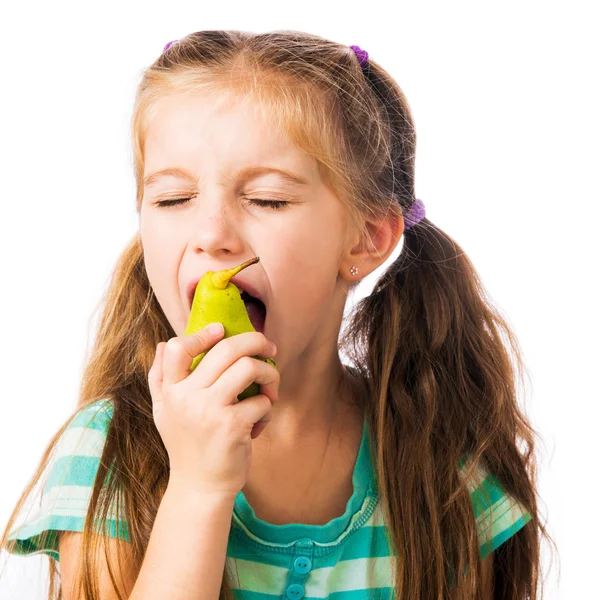 Little girl with pear — Stock Photo, Image