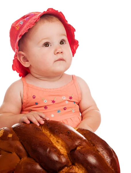 Baby girl and bread — Stock Photo, Image