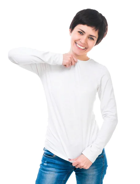 Smiling brunette stretches white blouse — Stock Photo, Image