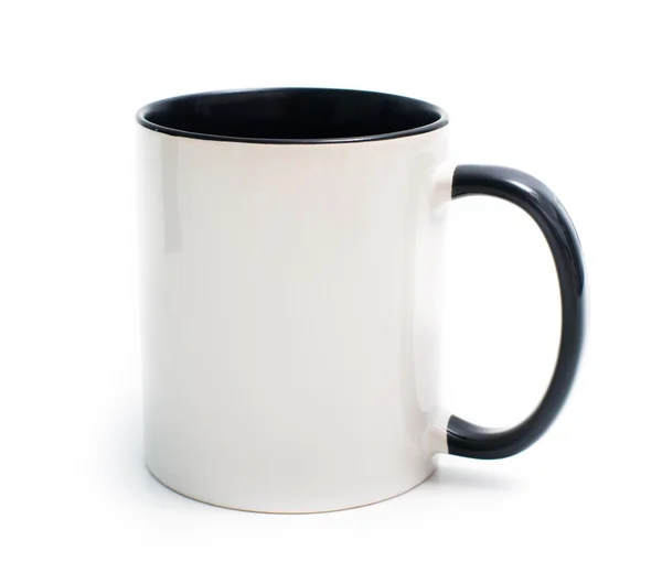 Taza blanca con un mango negro — Foto de Stock