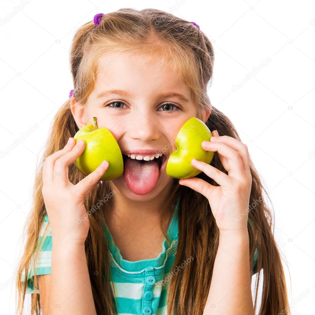 little girl with apples