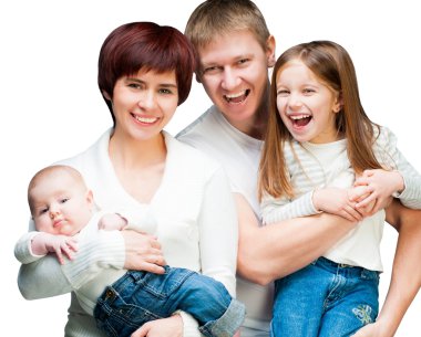 çok gülümseyen aile kameraya bakıyor
