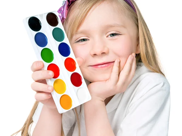 Liten flicka håller upp paint — Stockfoto